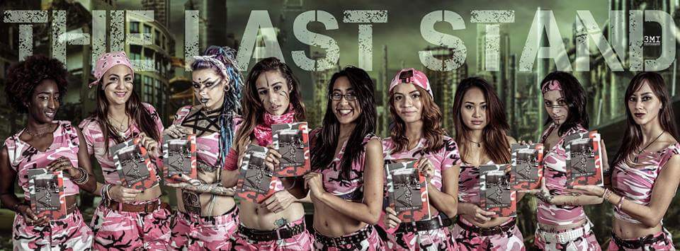 Pink Army ladies holding copies of The Last Man